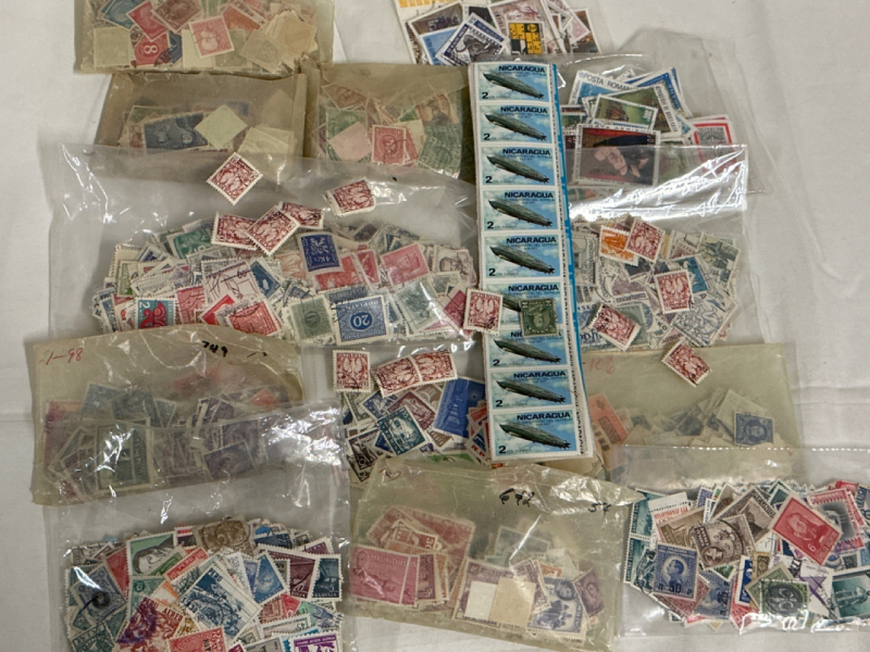 Huge Vintage Stamp Collectors Lot Including a Large Assortment of Stamps From Around The World