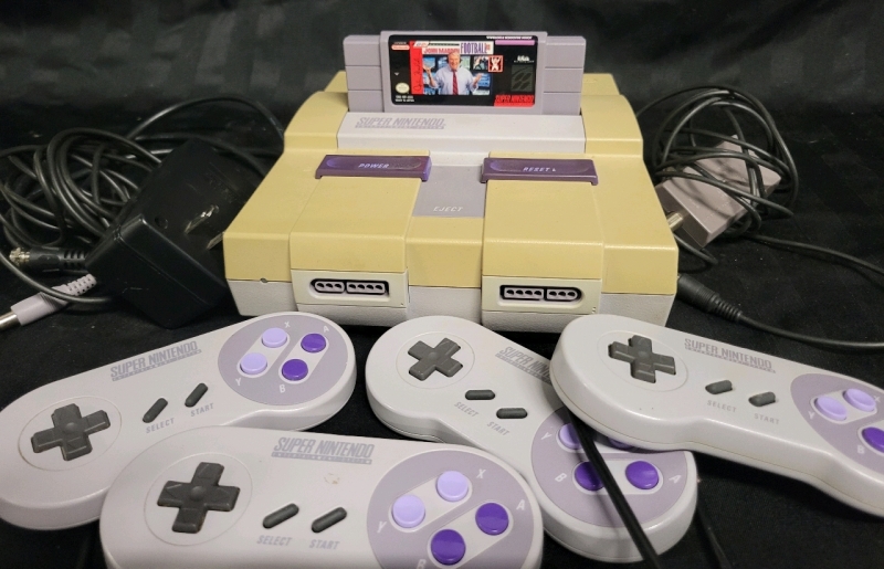 Vintage Super Nintendo Entertainment System With 4 Controllers, Power And TV Adapters With John Madden Football 93 Game Cartridge Tested For Power, One Controller Has Cord Damage