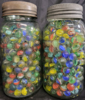 2 Large Jars Filled With Cats Eye Marbles