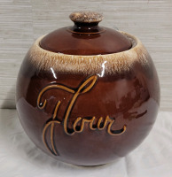 Vintage USA Hull Brown Drip Flour Canister with Lid . Measures 10" tall & 9.5" diameter. No chips or cracks