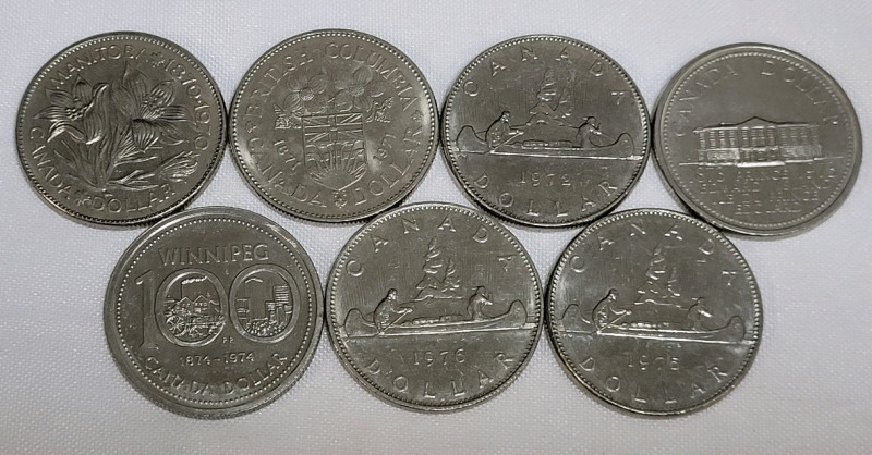1970 - 1976 Canadian One Dollar Coins . Seven (7) Coins in Various Condition