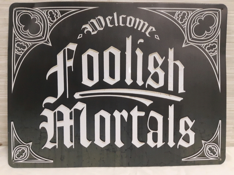 New | " Welcome Folish Mortals " Metal Hanging Wall Sign ( 16" x 12" )