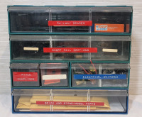 6-Drawer Storage Cabinet with Toy Train Parts & Accessories . Cabinet measures 12"×11"×6"