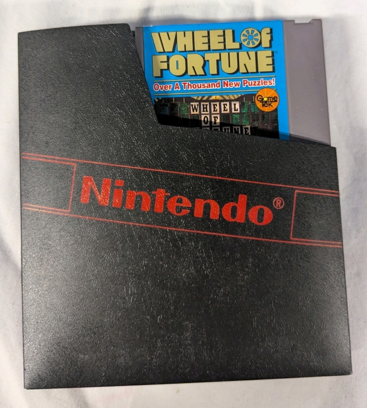 Vintage: Wheel of Fortune: Family Edition for the Nintendo Entertainment System. Comes with Cartridge Sleeve and Instruction Booklet.