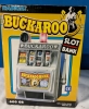 Radica Buckaroo Slot Bank. (Not a Gambling Device.) Box Stands 10" Tall - 2