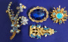 Lot of vintage goldtone and rhinestone brooches