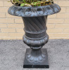 Large Plastic Planter Urn with Faux Peony Flowers . Measures 41" tall - 2