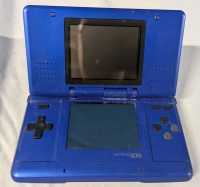 Nintendo DS. No charge cord or stylus available. Minor marks from use present.