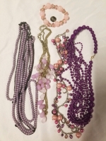 Lot 4 of vintage to modern beaded necklaces and a bracelet.