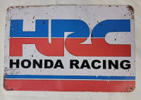 New - HRC Honda Racing Tin Sign . Measures 11 3/4"×8" . Minor bend to sign