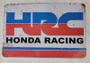 New - HRC Honda Racing Tin Sign . Measures 11 3/4"&times;8" . Minor bend to sign