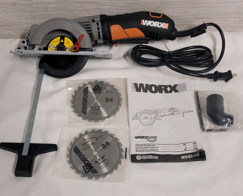 New - WORX 4 1/2" Electric Compact Circular Saw w/Two (2) Blades & Manual , Model # WX429L . Tested Working . Retail $100