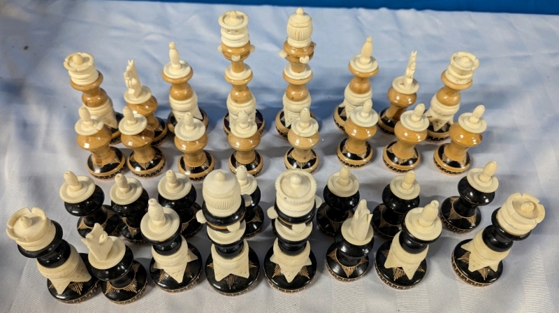 Assorted Chess Pieces Made of Natural Style Materials. King measures 5.75" Tall, with a 2.75" Diameter Base.