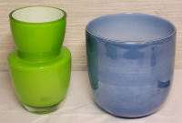 Blue & Green Glass Vases . Blue measures 6.5" tall & Green measures 7 1/4" tall . No chips or cracks