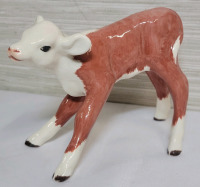 Vintage Hereford Calf Ceramic Figurine , measures 5"×4" . No makers mark