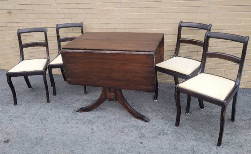 Vintage Oak Drop Leaf Dining Room Table & Four Chairs . Table measures 38"×26"×30" Leafs Down & 55"×26"×30" Leafs Up .