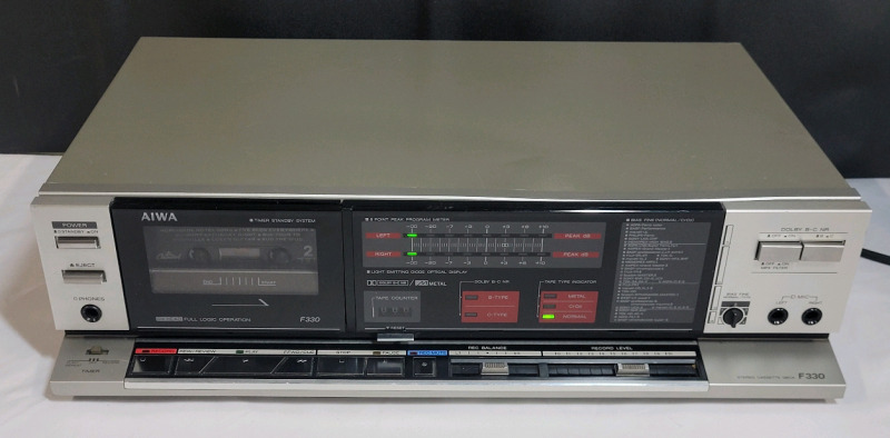 AIWA F330 Stereo Cassette Deck . Tested , All Functions Working . Includes Stompin Tom Conners " Live " at the Horseshoe (classic)