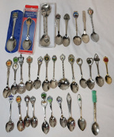 Vintage to Modern Souvenir Spoons . Includes Vintage Walt Disney Spoon , Sterling Silver Spoon & Mexico Alpaca Silver Spoon . 31 Spoons