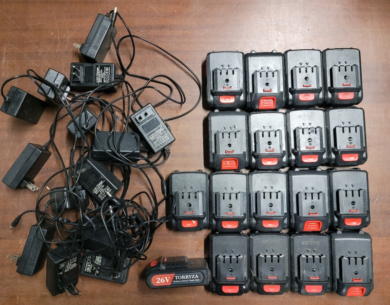 26V Torryza Chainsaw Batteries & Chargers . 18 Batteries with Chargers . Untested