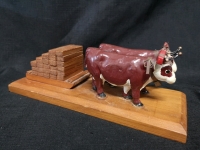 Metal Bulls Figure on Wood