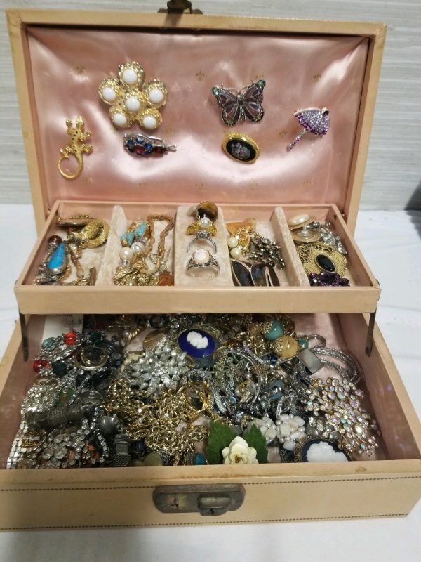 Vintage jewelry box with contents