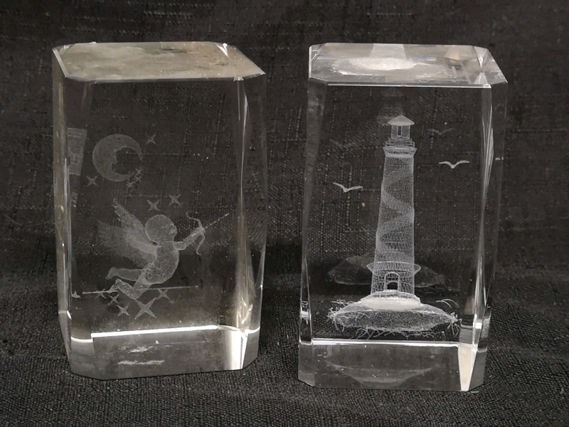 2 Glass Laser Etched Paperweights - Cupid & Lighthouse | 3" Tall ea