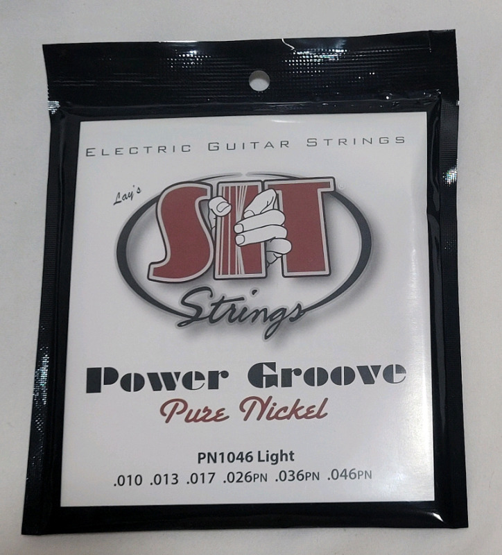 New - S.I.T. String PN1046 Light Pure Nickel Wound Electric Guitar String Set . Strings Included : .010 , .013 , .017 , .026PN , .036PN & .046PN
