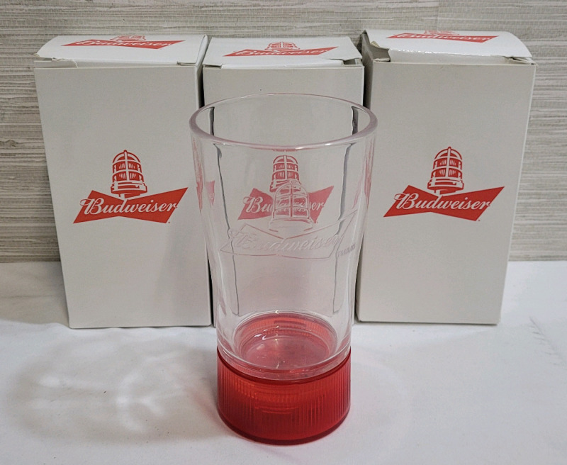 New - Budweiser Hockey Red Light Beer Glass . Requires 2AAA Batteries and Budweiser App . Three (3) Glasses