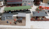 HO Scale Railroad Model Toy Train Factories , Buildings, Houses , Green Houses , Platforms, Restaurants plus more . 20 Buildings , Train Transformer & Rubbermaid Tote - 6