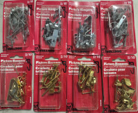 8 New Packs | Of Bulldog Picture Hangers | 4 Packs Of 16 1-100 LBS With Nails & 4 Packs Of 10 1-100 Brass Plated With Nails