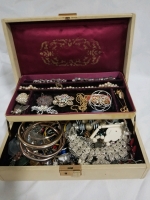Vintage jewelry box with contents