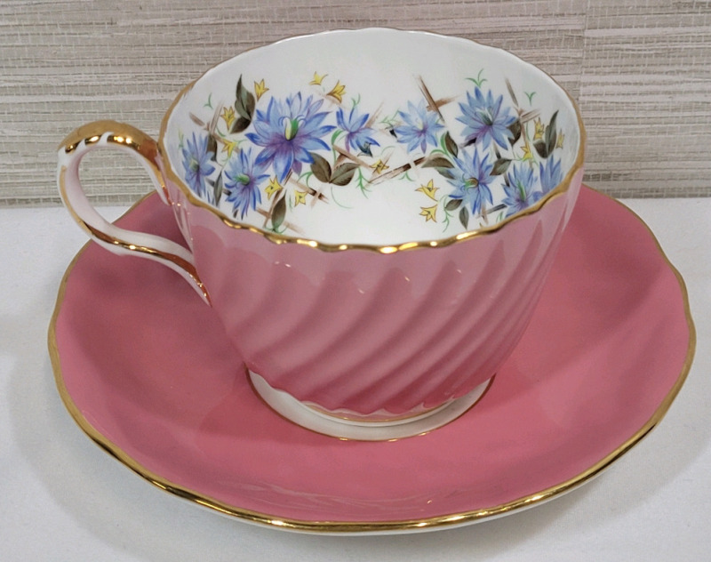 Aynsley Pink w/Flowers Cup & Saucer . Both Ring True . Slight Minor Wear to Gold Trim on Cup