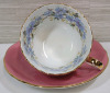 Aynsley Pink w/Flowers Cup & Saucer . Both Ring True . Slight Minor Wear to Gold Trim on Cup - 2