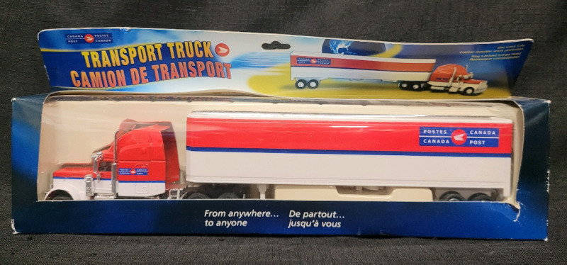 Canada Post Transport Truck Die Cast Truck in Original Box , measures 12" long . Die Cast Cab Only , Plastic Trailer . PVC Clear Window Loose