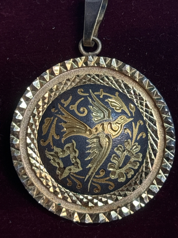 Damascus Bird Pendant Bird Plant Tendrils and Leaves Diamond Cutting on frame