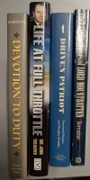 4 Assorted Military Books. 2 Softcover & 2 Hardcover Largest 9.5” tall