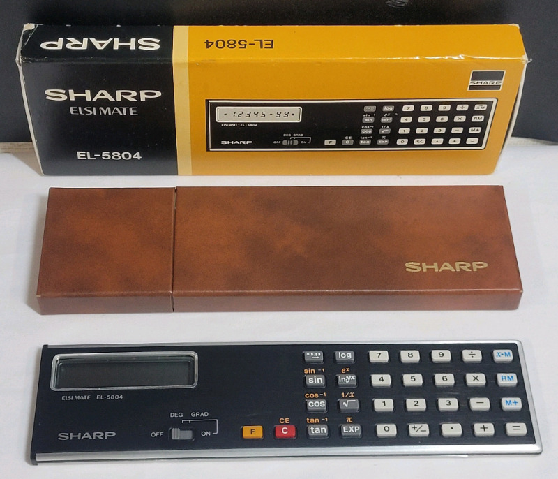 Vintage Sharp Elsimate EL-5804 LCD Handheld Display Calculator w/Original Case , Box & Manual . Untested , requires 3x small button sized cell batteries