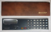 Vintage Sharp Elsimate EL-5804 LCD Handheld Display Calculator w/Original Case , Box & Manual . Untested , requires 3x small button sized cell batteries - 2