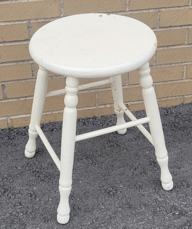 Wooden Stool , measures 17 3/4" tall & 13" diameter seat . Painted White