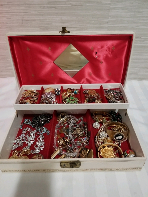 Vintage jewelry box with contents