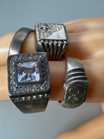 Four Sterling Large size Rings Stamped