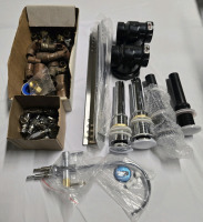 Assorted Plumbing Lot | Includes But Isn't Limited To; Bathroom Pop Up Drain Stoppers, A Faucet & Several Different Plumbing Fixtures