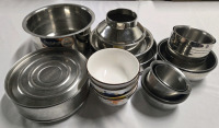 Assorted Kitchen Lot, Includes But Isn't Limited To; Several Stainless Steel Bowls From 3" - 6.5" Diameter, Set Of 4 Decorated Ceramic Bowls ( 4.5" Diameter 2.5" Tall, & A pot Without Lid ( 8.5" Diameter 4.5" Tall )