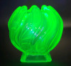 Vintage 1930s Art Deco Uranium Glass Posy Vase , Bagley Equinox Bud Vase , Stamped Made in England . Measures 4 1/8" tall & 4" diameter . Fracture cracks near bottom . Top shelf piece - 5