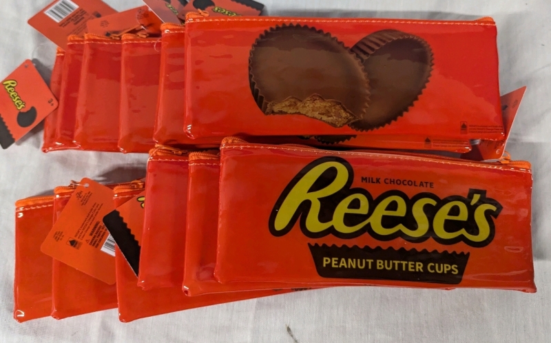 12 New Reese's Pieces Peanut Butter Cup Pencil Cases. 7" by 3.5"