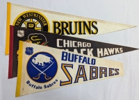3 NHL Team Pennants - Black Hawks, Bruins and Sabers. Largest 30" Long.