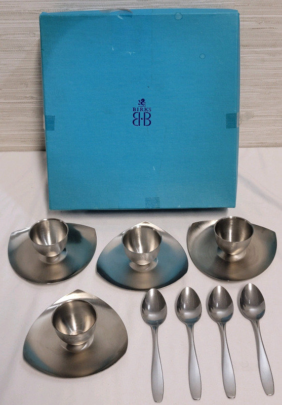 BIRKS Mid-Century Modern Stainless Steel Egg Cups with Spoons , Set of 4 . 18-8 Stainless Steel . Black mark on one of the Cup edges