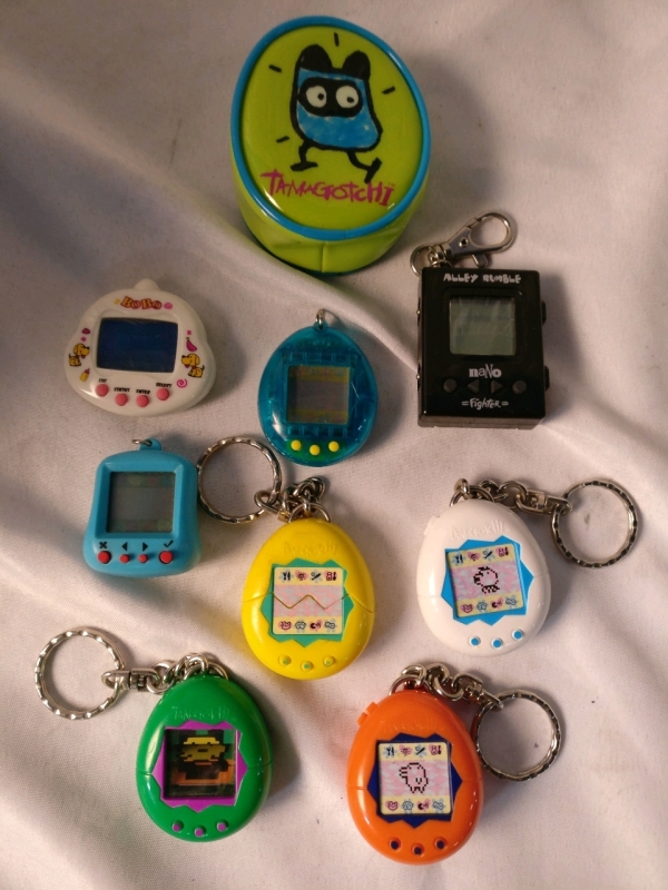 4 Tamagotchi & 4 Other Digital Games - No Batteries