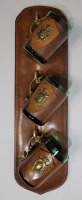 Vintage Leather Wall Plaque with Three (3) Green Glass Mugs Surrounded in Leather w/The Coat of Tuscany . Made in Italy . See Photos for measurements