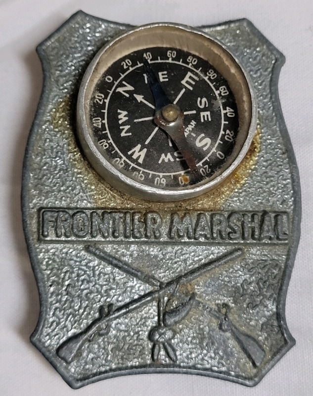 Vintage 1960s Frontier Marshal Compass Badge Collectable Souvenir from Disneyland . Measures 1.5"×2"